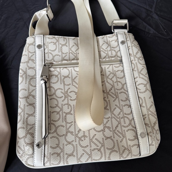 Calvin Klein Handbags - CK Signature Monogram Cream Crossbody Bag